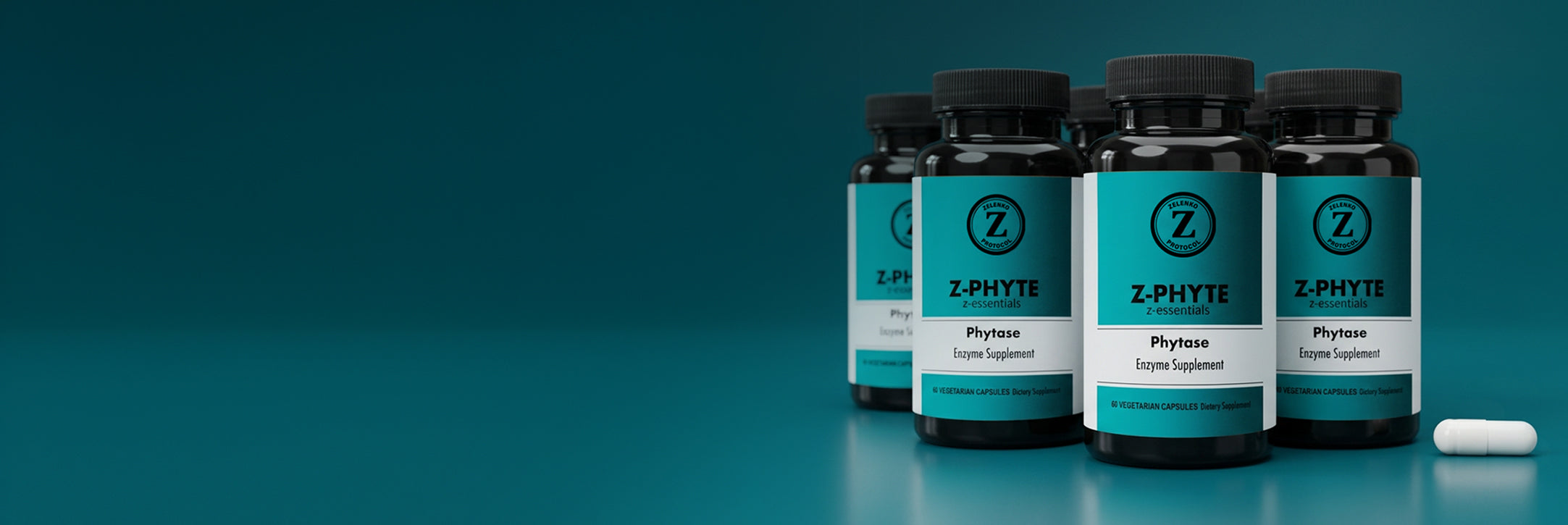 Four dark supplement bottles with teal labels and black caps arranged on a teal gradient background, with a single white capsule lying beside them.